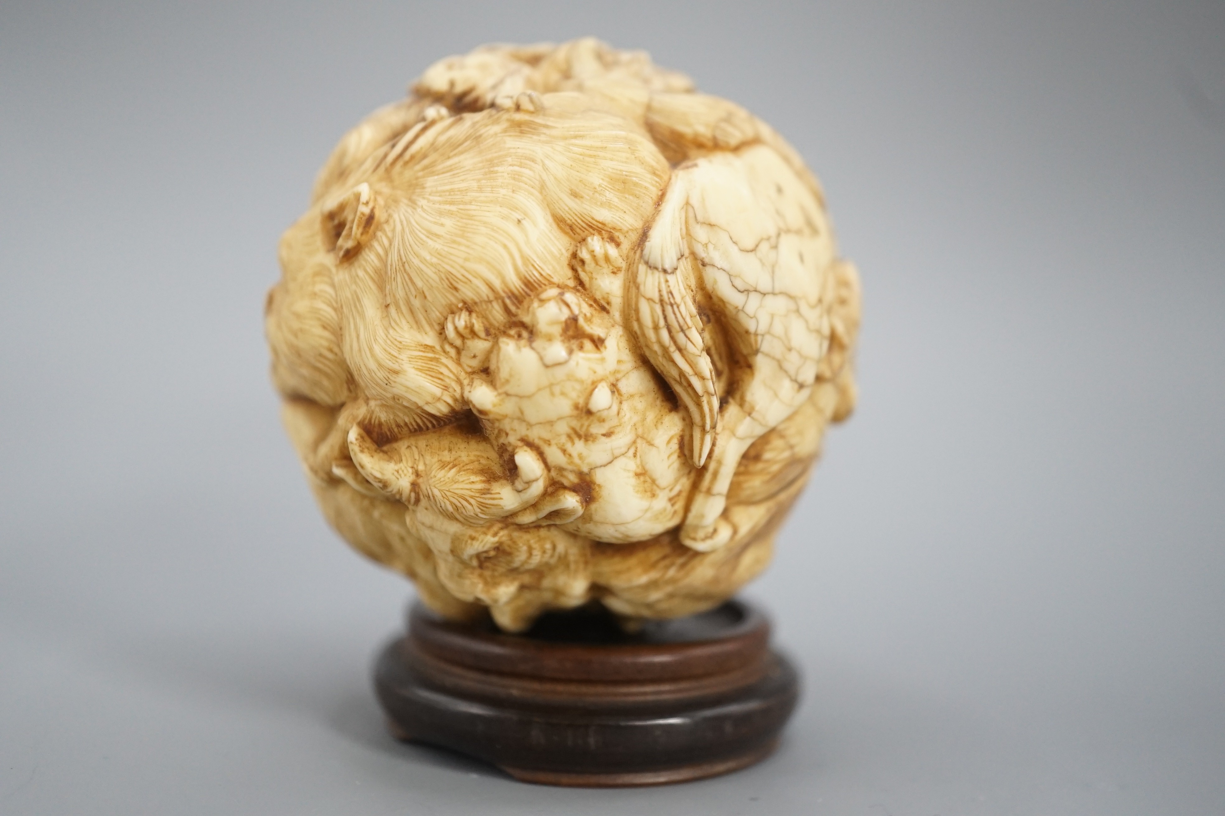 A Japanese ivory ‘Zodiac animal’ ball, early 20th century, 5cm